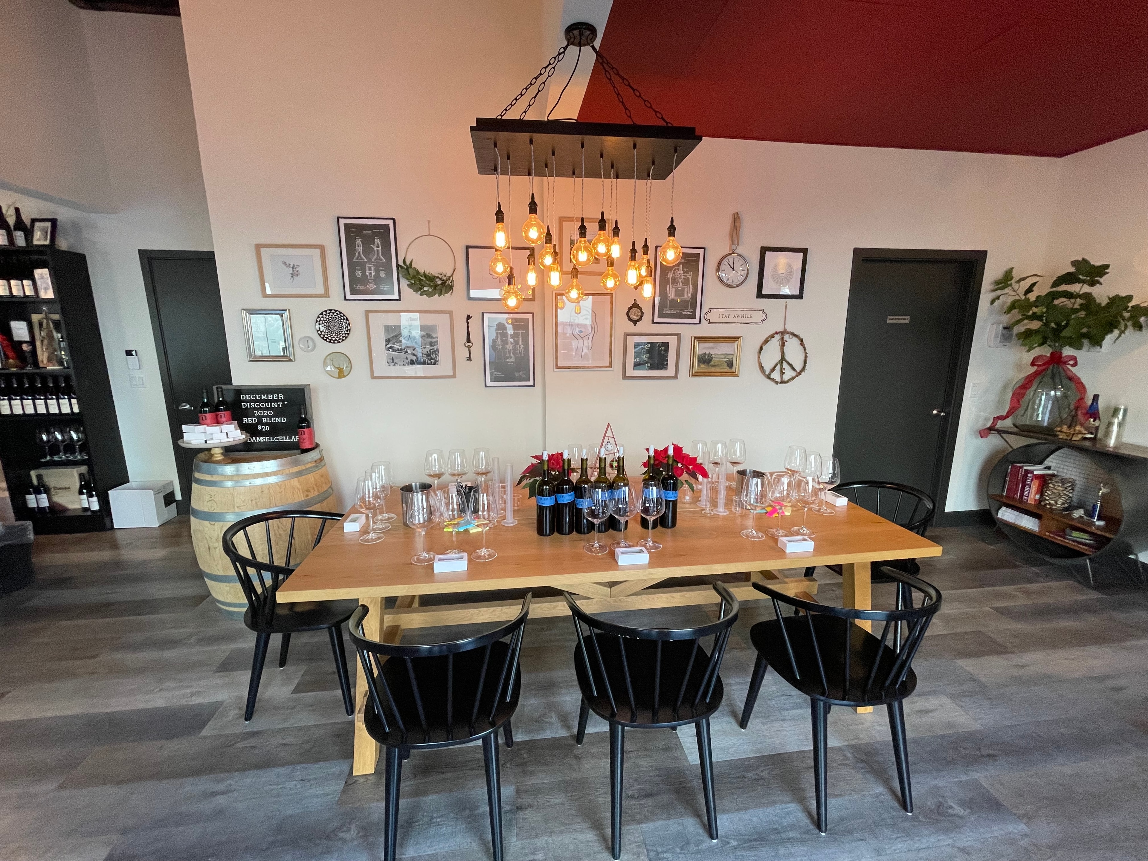 Damsel Cellars tasting room with wine bottles and glasses